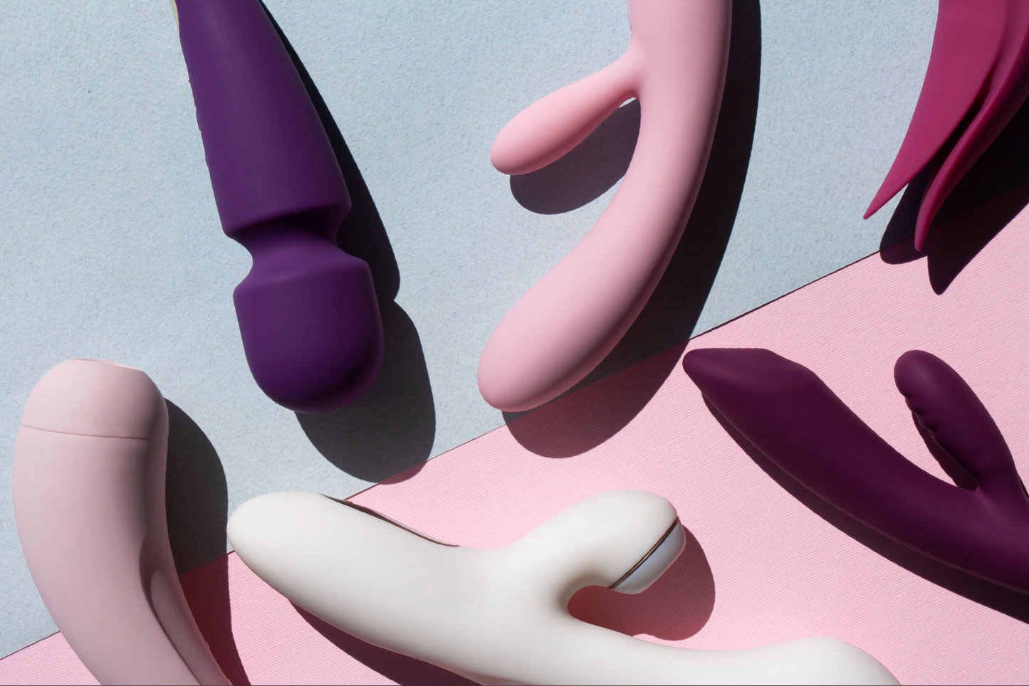 purple-pink-white-vibrators-sex-toys-pink-background
